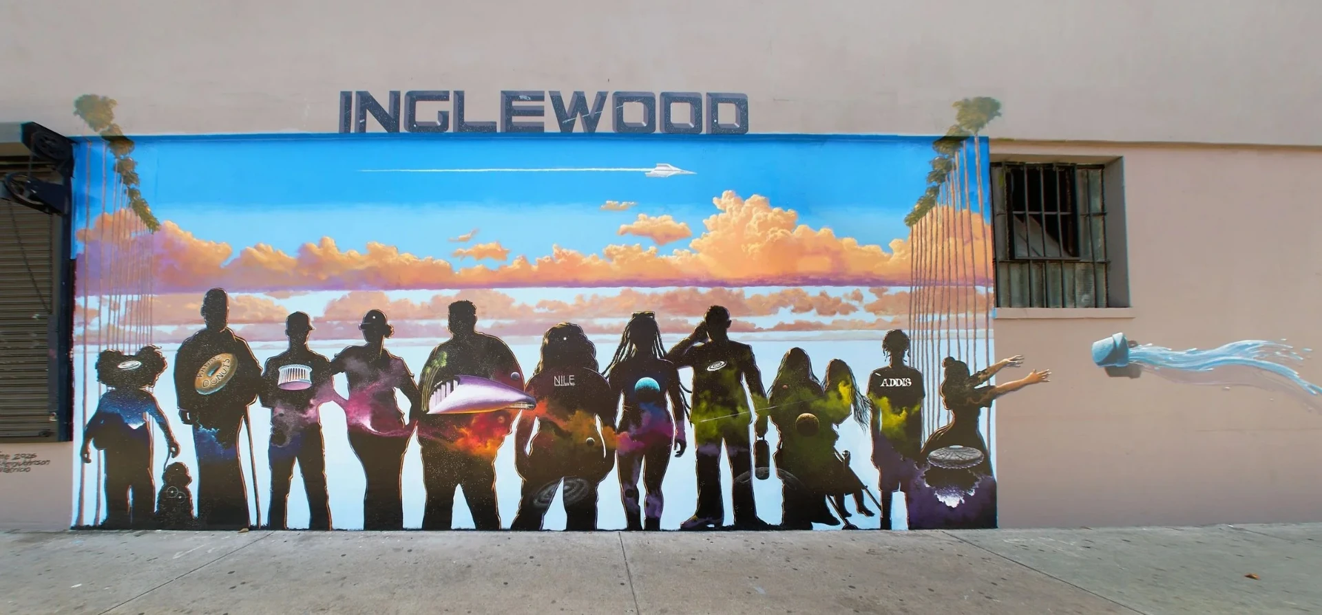 Communal Time by Patrick Henry Johnson — full elevation at Market Street and Manchester Boulevard